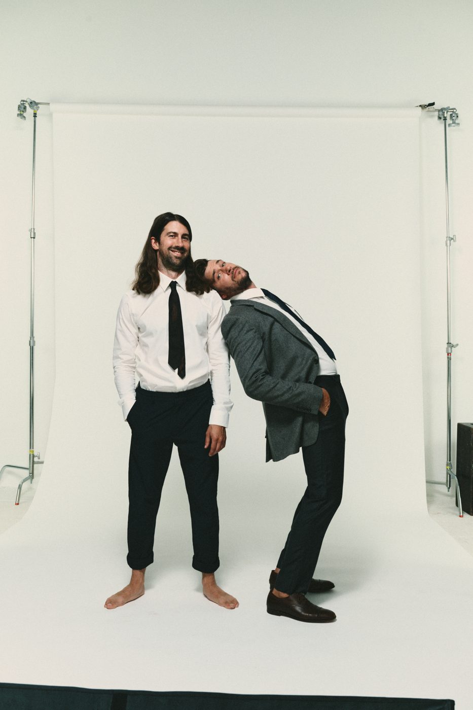 Suit and tie, bent backward